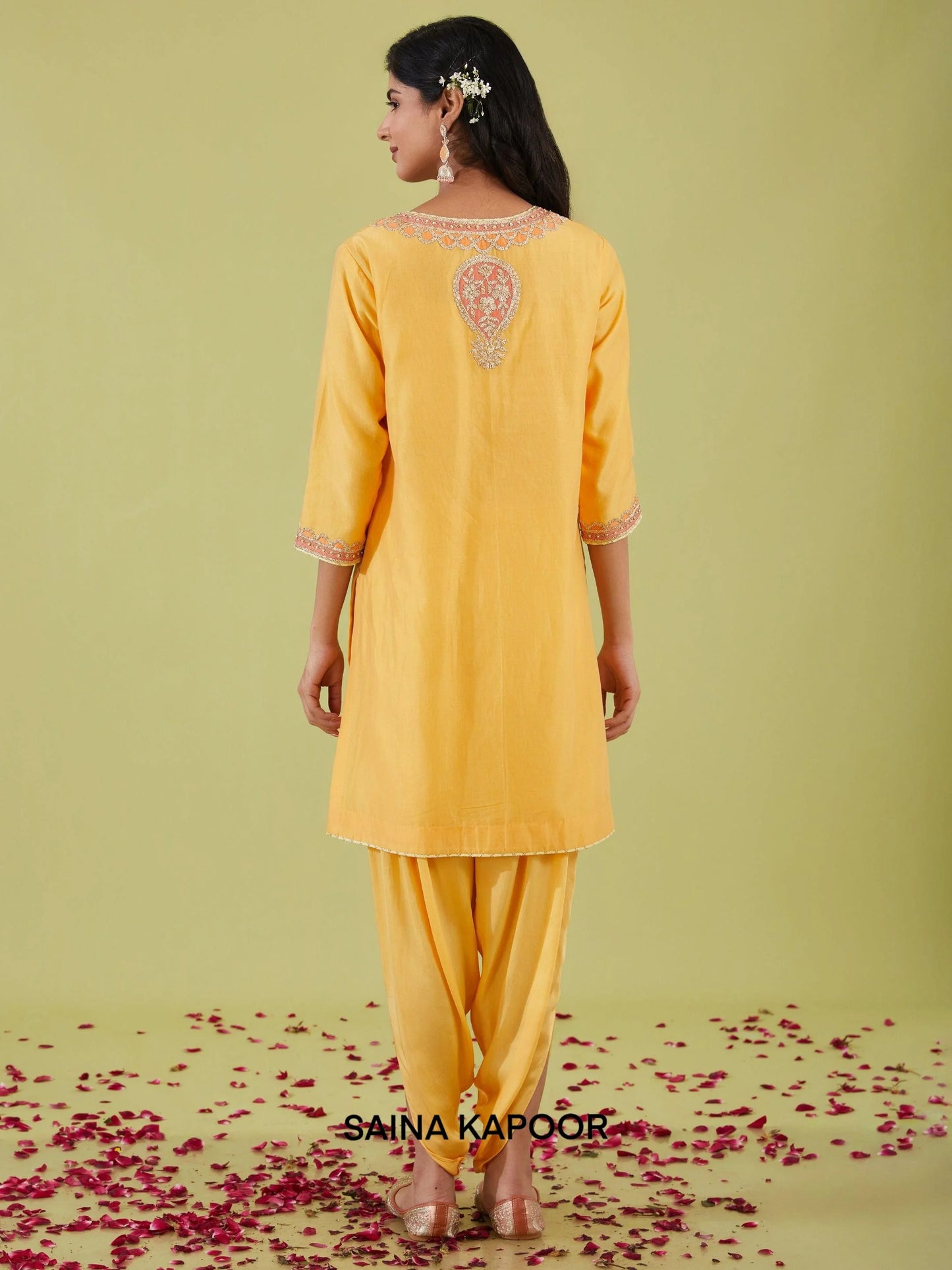Back view of yellow Bamber Satin A-line kurta with samosa pants — designer ethnic wear — Saina Kapoor