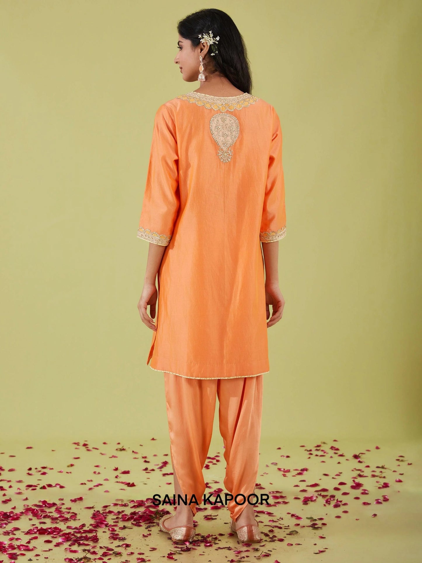 Back view of peach Bamber Satin A-line kurta with samosa pants — designer ethnic wear — Saina Kapoor