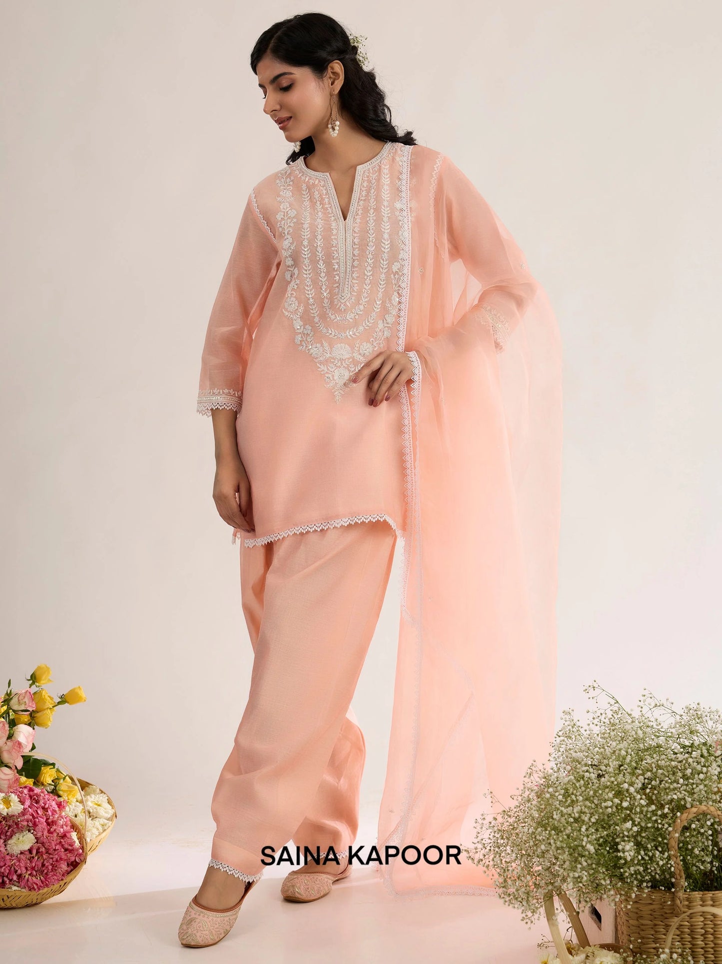 Peach pink Chanderi short kurta with Aari embroidered yoke paired with matching salwar and organza dupatta - Saina Kapoor