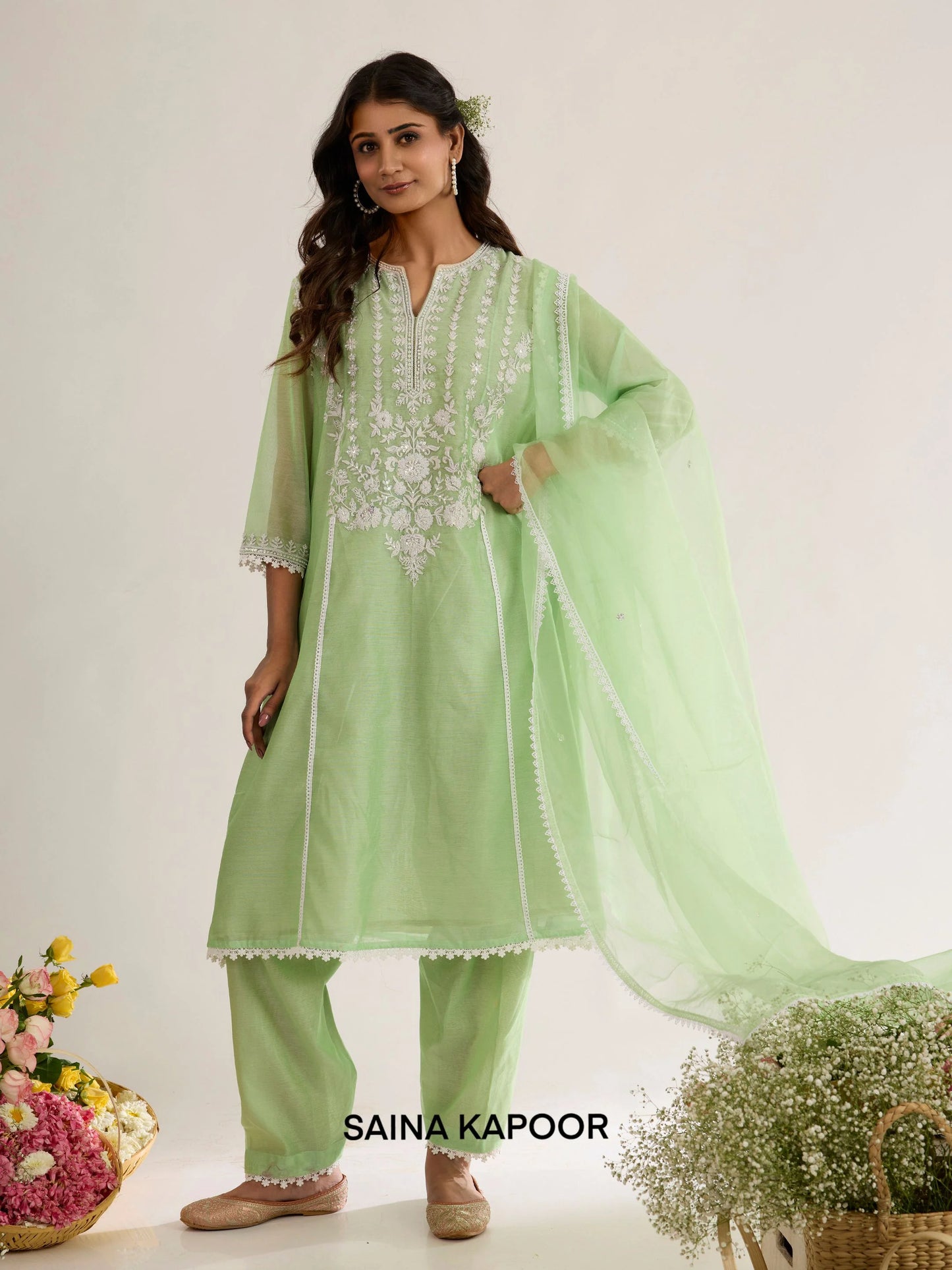 Mint green Chanderi short kurta with Aari embroidered yoke paired with matching salwar and organza dupatta - Saina Kapoor
