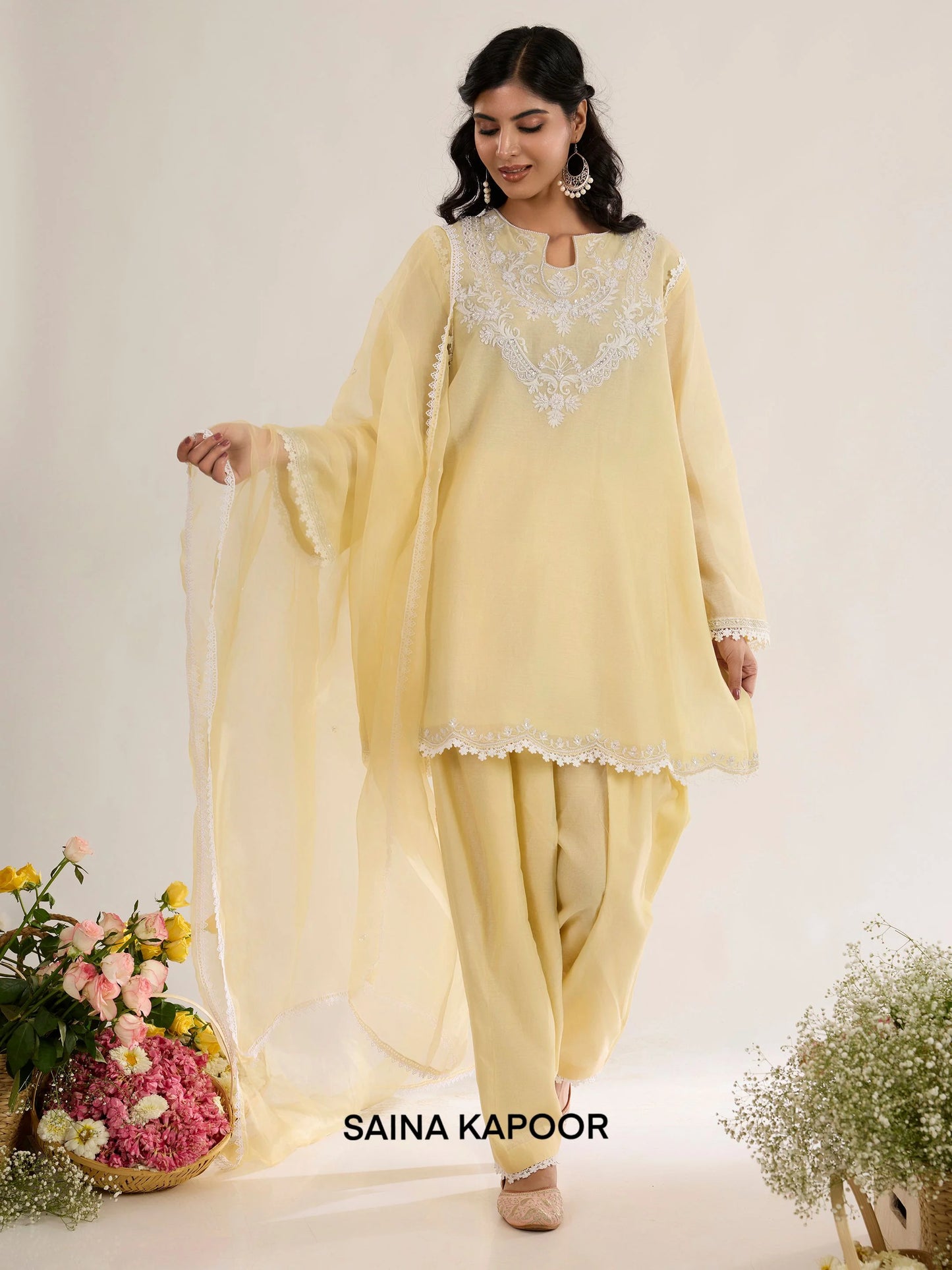 Pale yellow Chanderi short kurta with Aari embroidered yoke paired with matching salwar and organza dupatta - Saina Kapoor