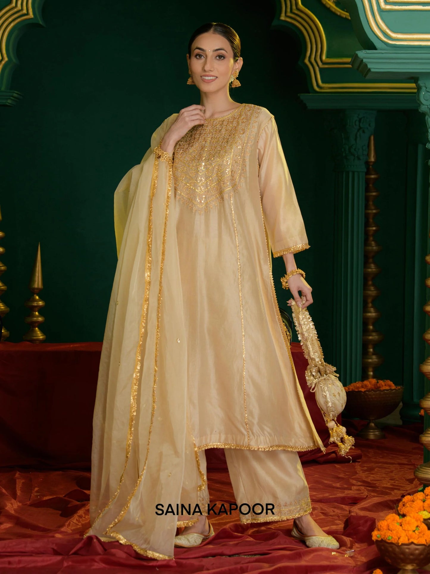 Beige Chanderi A-line kurta with gold gota patti sequin embroidered yoke & matching palazzo pants, dupatta & embroidered potli bag — Saina Kapoor