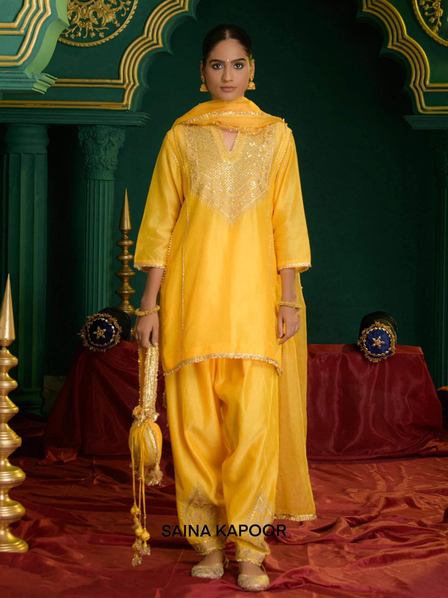 Yellow Chanderi short kurta with gold sequin gota patti embroidered sheer yoke & matching dhoti salwar, dupatta & potli bag — Saina Kapoor