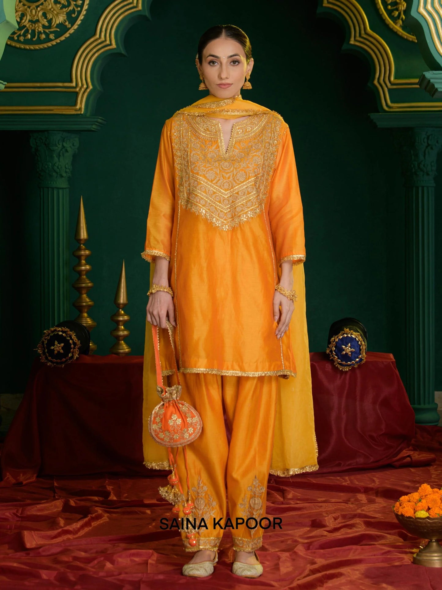 Orange marigold Chanderi short kurta with gold gota patti embroidered V-notch yoke & matching salwar, dupatta & embroidered potli bag — Saina Kapoor