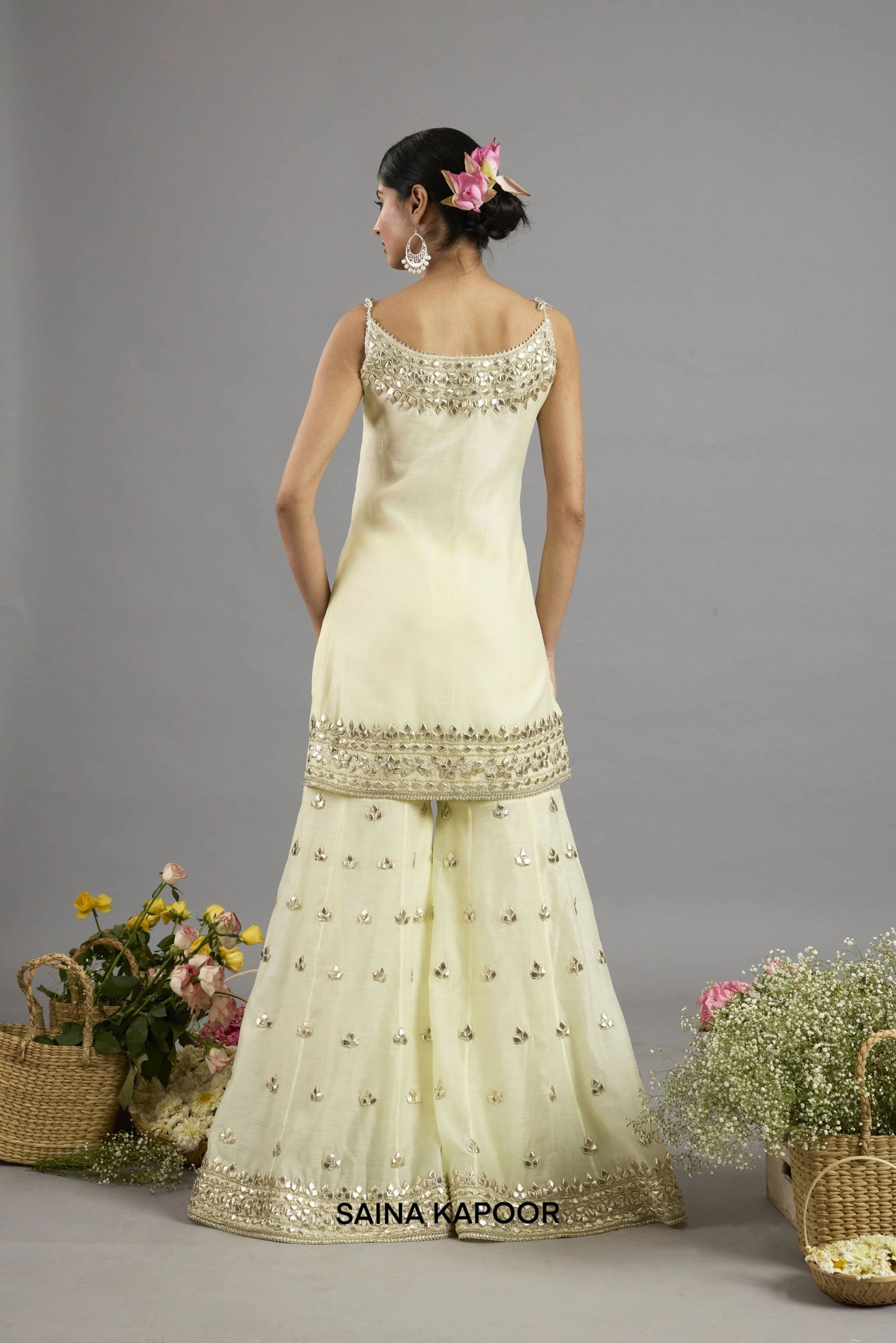 Afnan kurta back view with sleeveless spaghetti strap neckline bordered in gota patti embroidery - Saina Kapoor