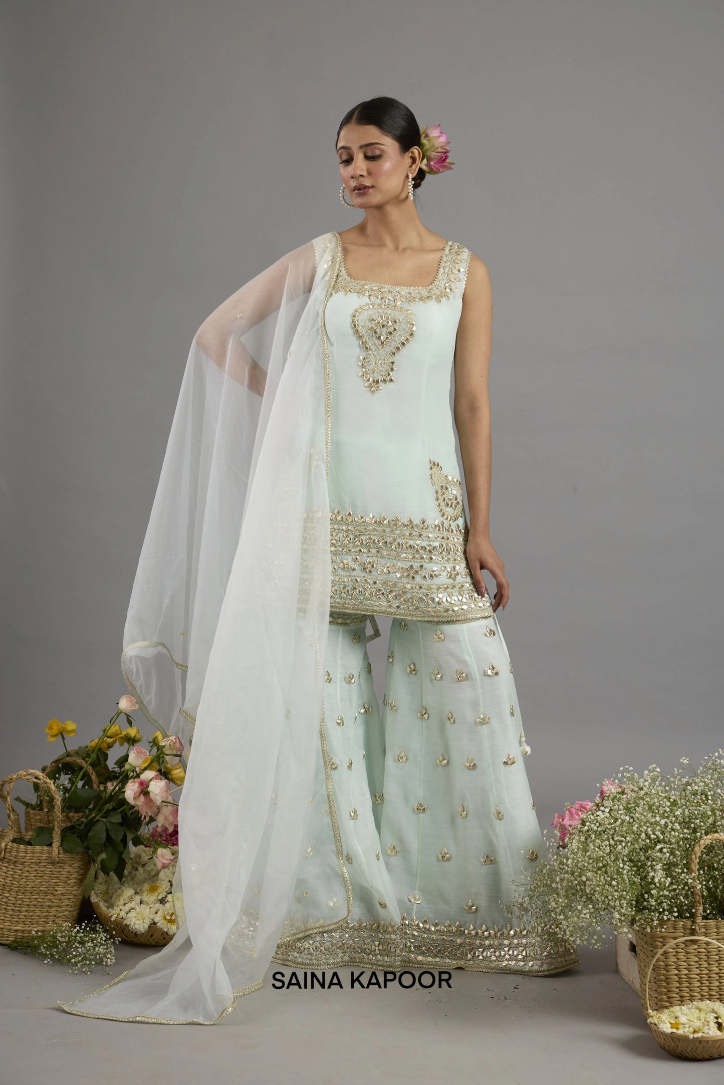 Abeeda mint green Chanderi sleeveless kurta with gota patti square neckline paired with matching flared gharara and organza dupatta - Saina Kapoor