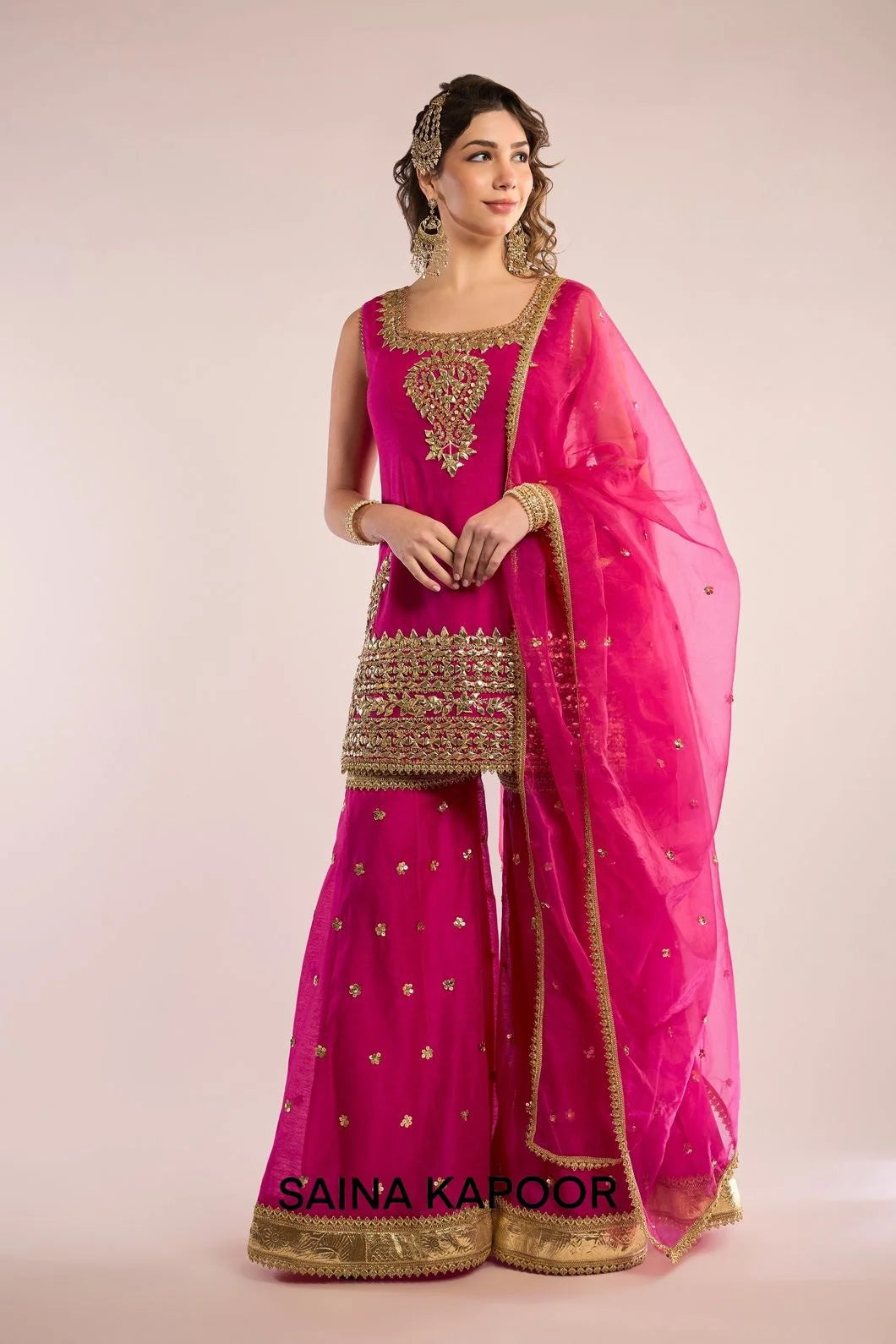 Fuchsia Chanderi sleeveless kurti with gota patti embroidered scoop neckline & matching gharara & fuchsia organza dupatta — Saina Kapoor