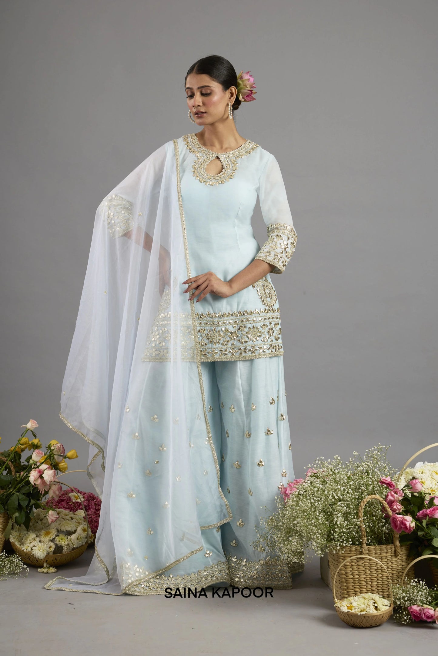 Ice blue Chanderi kurta with gota patti keyhole neckline paired with matching flared sharara and organza dupatta - Saina Kapoor