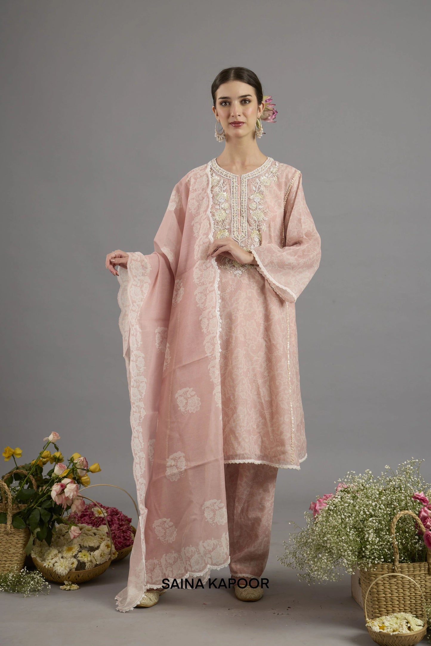 Pink Chanderi printed kurta salwar set with embroidered dupatta and pearl detailing by Saina Kapoor