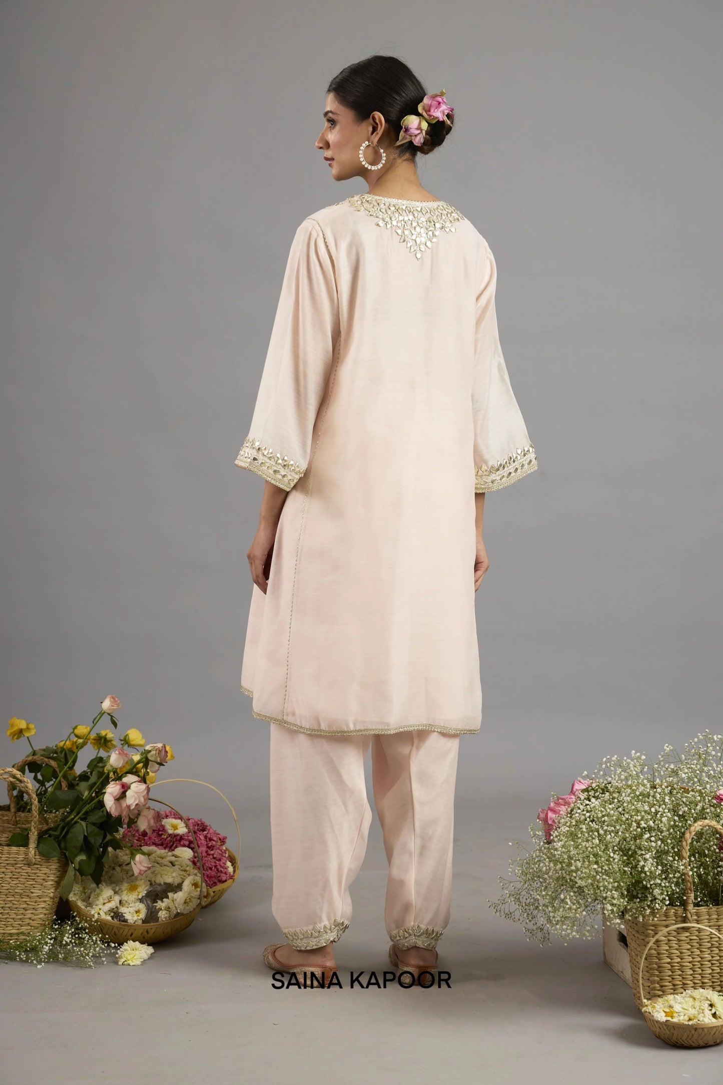 Aamina Peach Pink Chanderi long Choga back view with Gota Patti embroidered neckline, three-quarter sleeves and matching salwar - Saina Kapoor