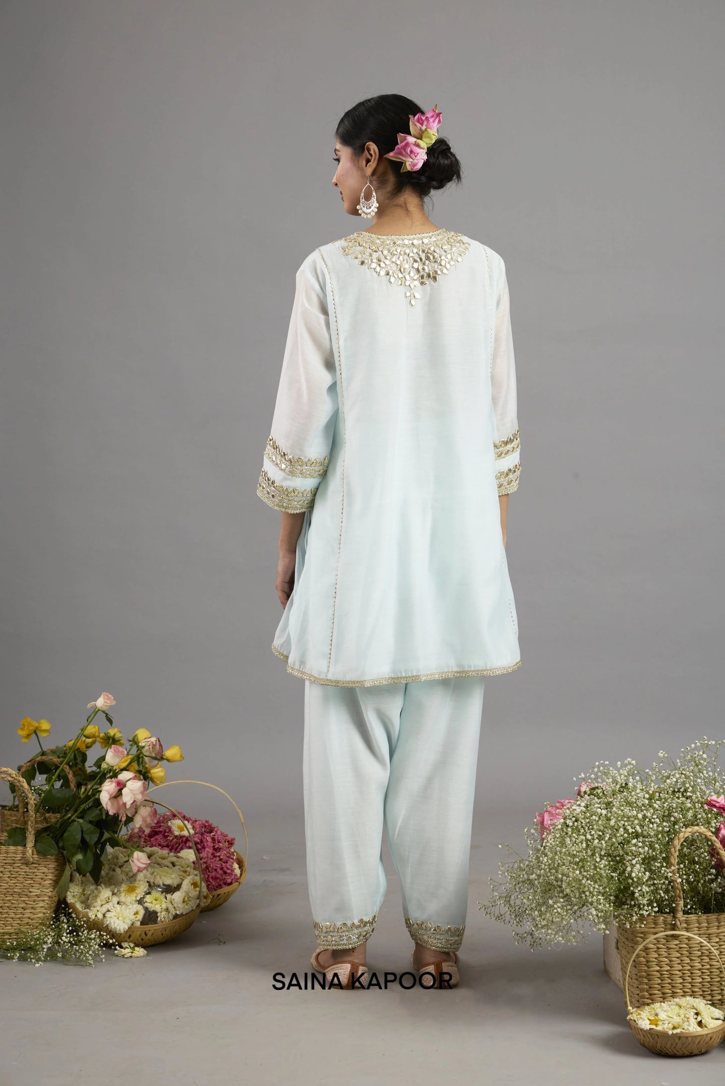 Abeer Ice Blue Chanderi short kurta back view with Gota Patti embroidered neckline, three-quarter sleeves and matching salwar - Saina Kapoor
