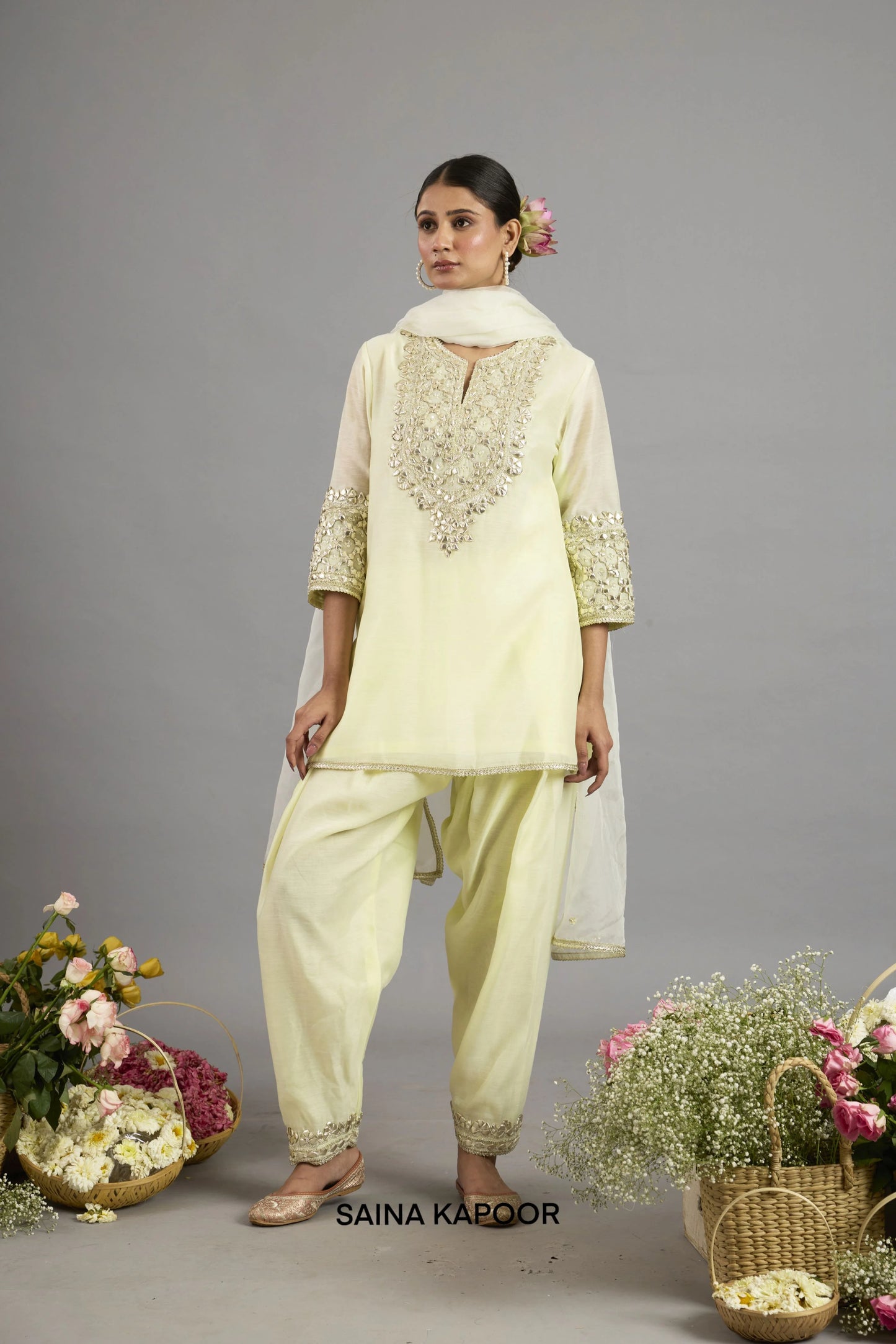Ayesha yellow Chanderi short kurta salwar suit with Gota Patti embroidered yoke, matching salwar and organza dupatta - Saina Kapoor