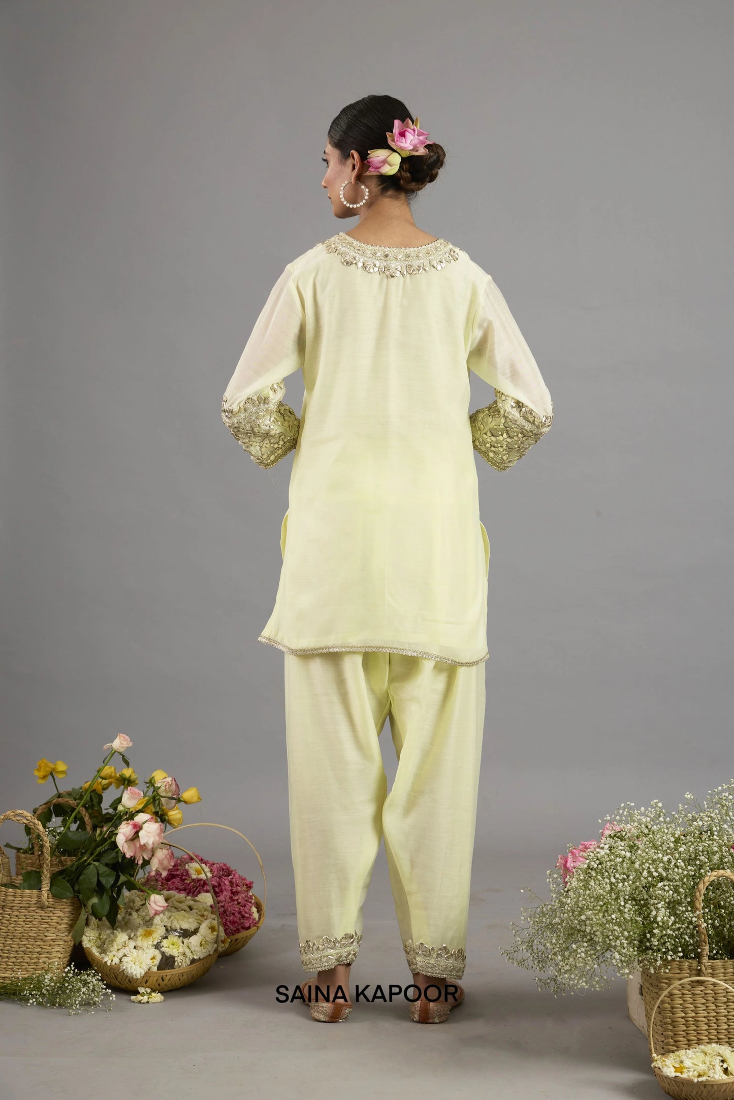Ayesha yellow Chanderi short kurta back view with embroidered neckline, three-quarter sleeves and matching salwar - Saina Kapoor