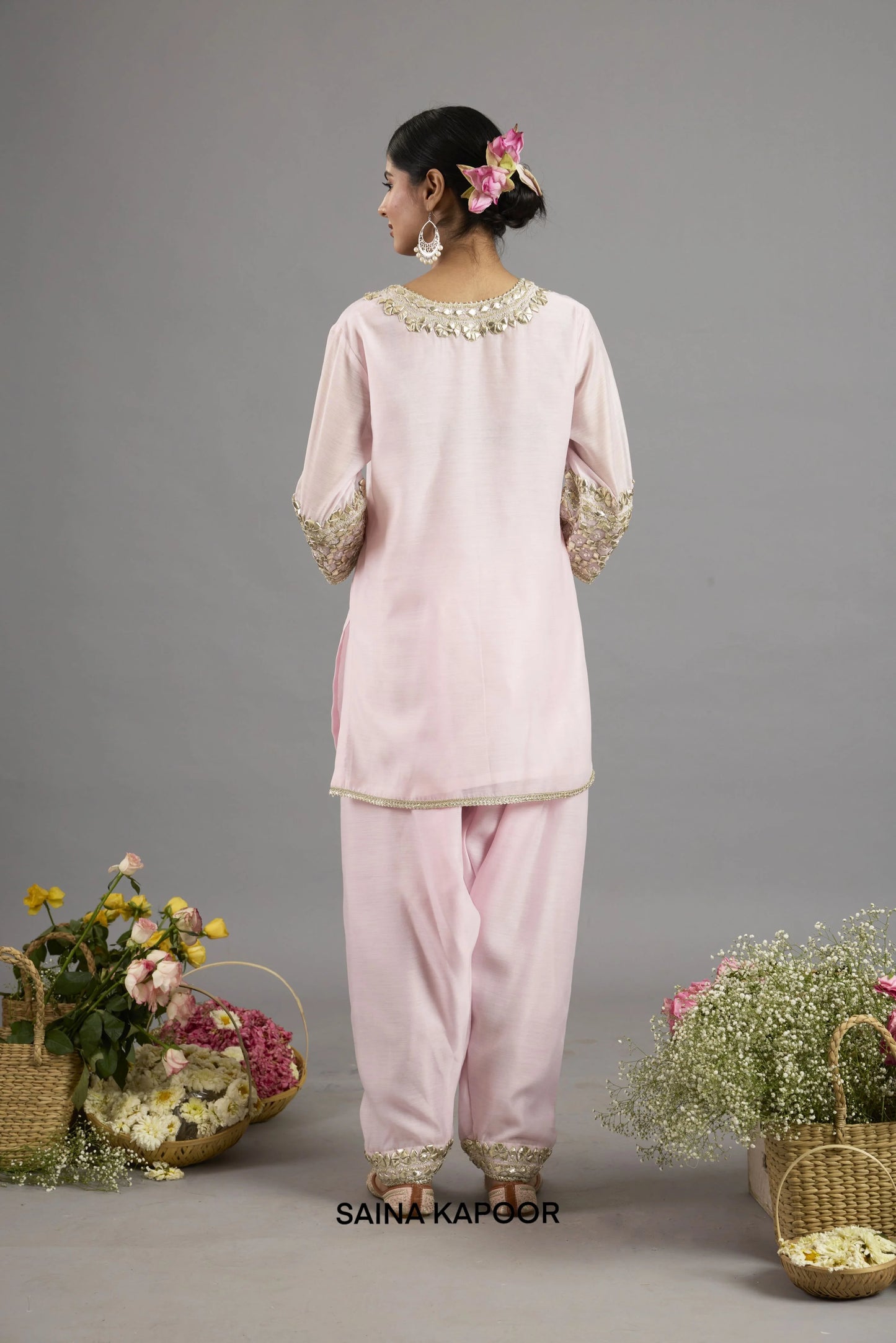 Afifa baby pink Chanderi short kurta back view with embroidered neckline, three-quarter sleeves and matching salwar - Saina Kapoor
