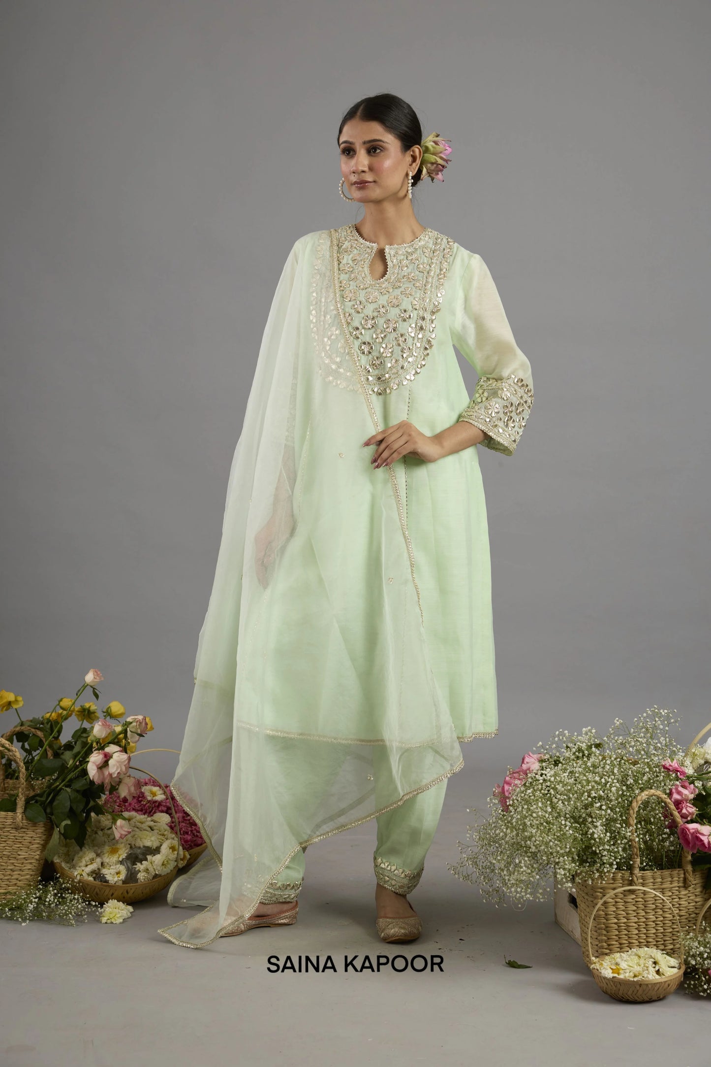 Arwa mint green long Chanderi kurta with gota patti floral medallion yoke paired with matching salwar and organza dupatta - Saina Kapoor