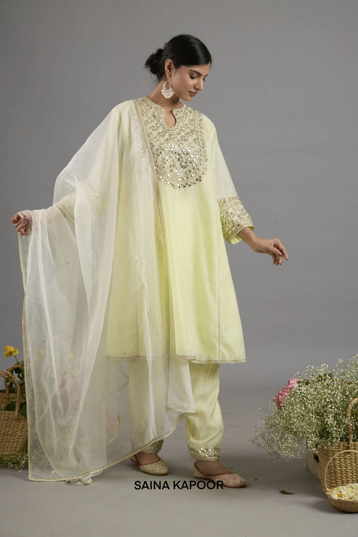 Asiya pale yellow Chanderi kurta with gota patti floral medallion yoke paired with matching salwar and organza dupatta - Saina Kapoor
