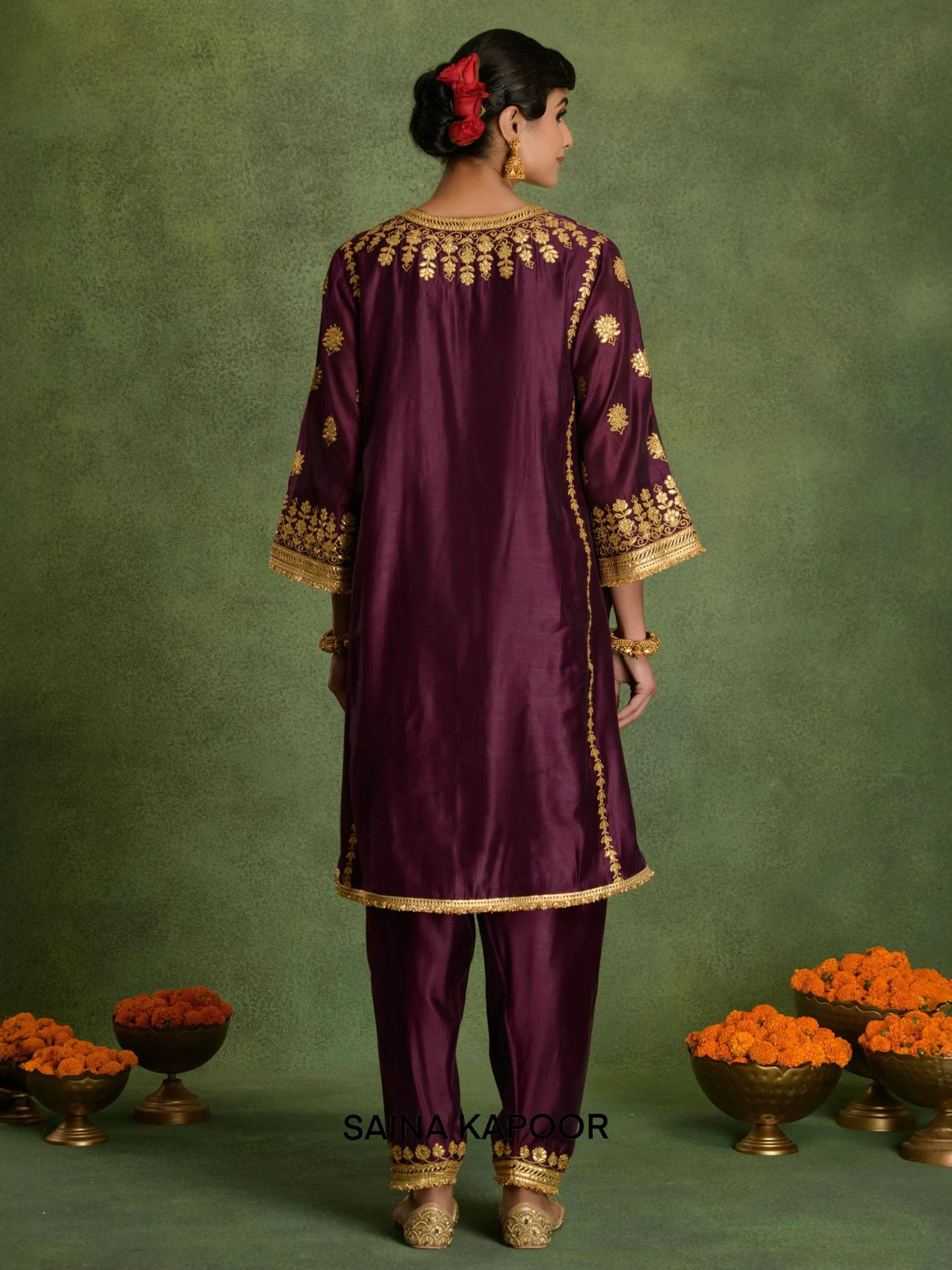 Back view of Deep Violet Chanderi long Choga kurta with salwar and organza dupatta by Saina Kapoor