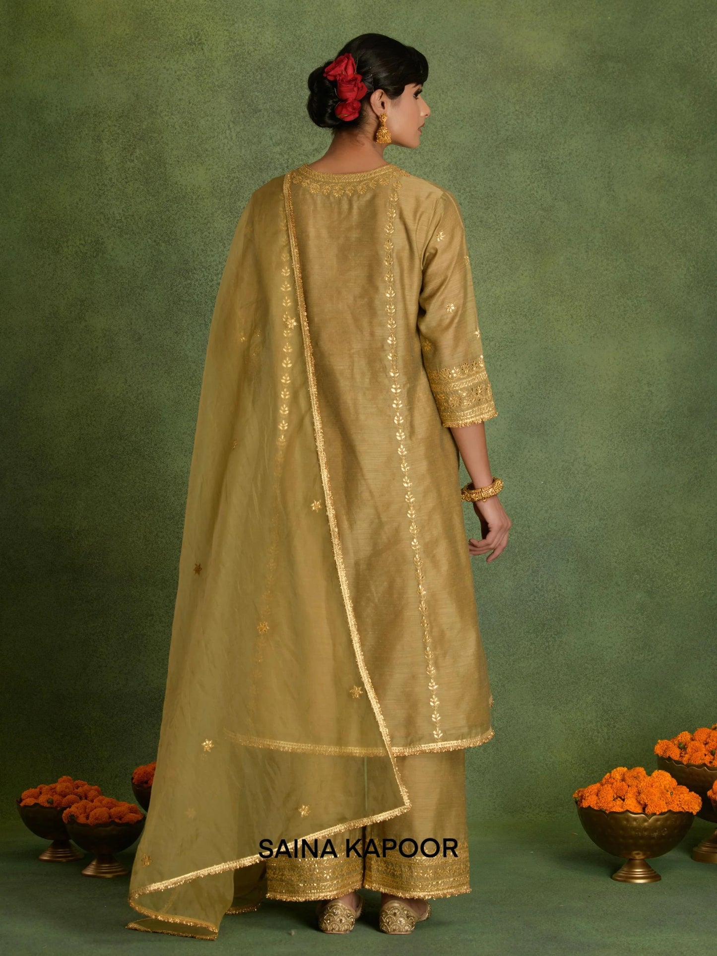 Back view of Deep Beige Chanderi long kurta with salwar and organza dupatta by Saina Kapoor