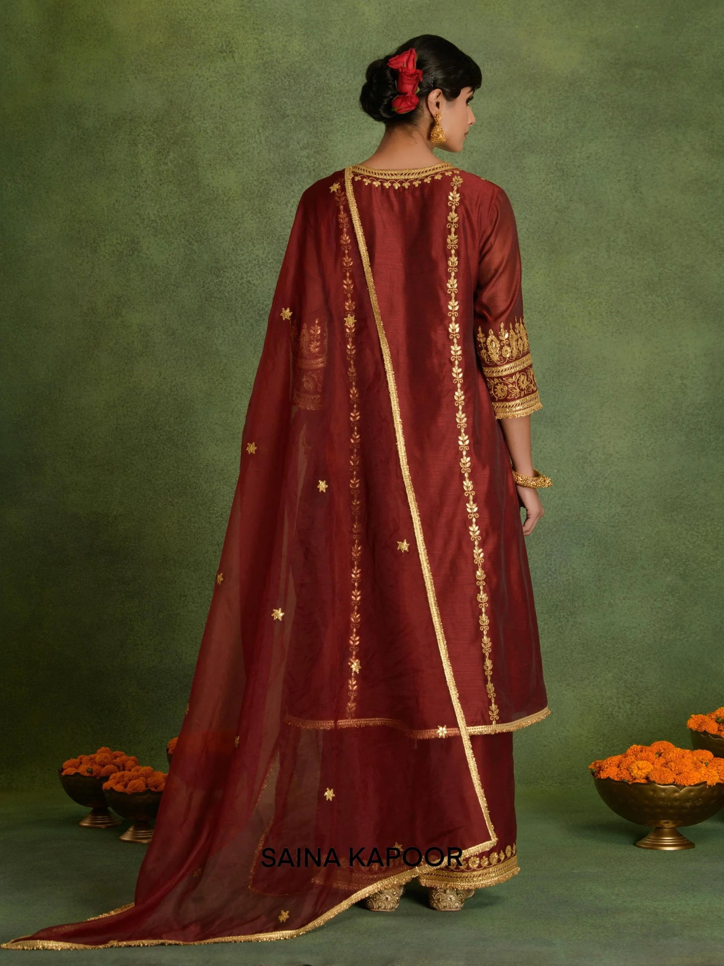 Back view of Mehroon Red Chanderi A-line kurta with palazzo and organza dupatta by Saina Kapoor