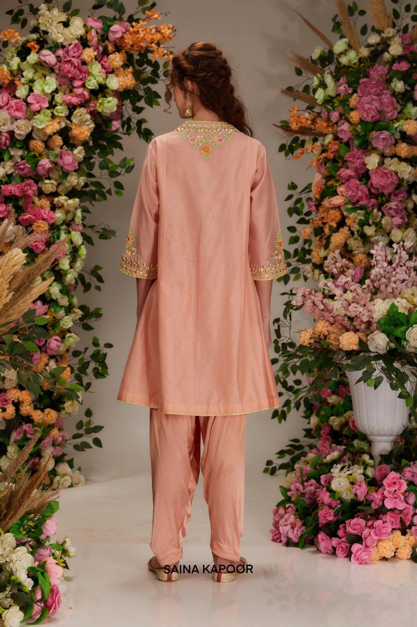 Back view of peach Chanderi long angrakha kurta set with full sleeves & organza dupatta — Saina Kapoor