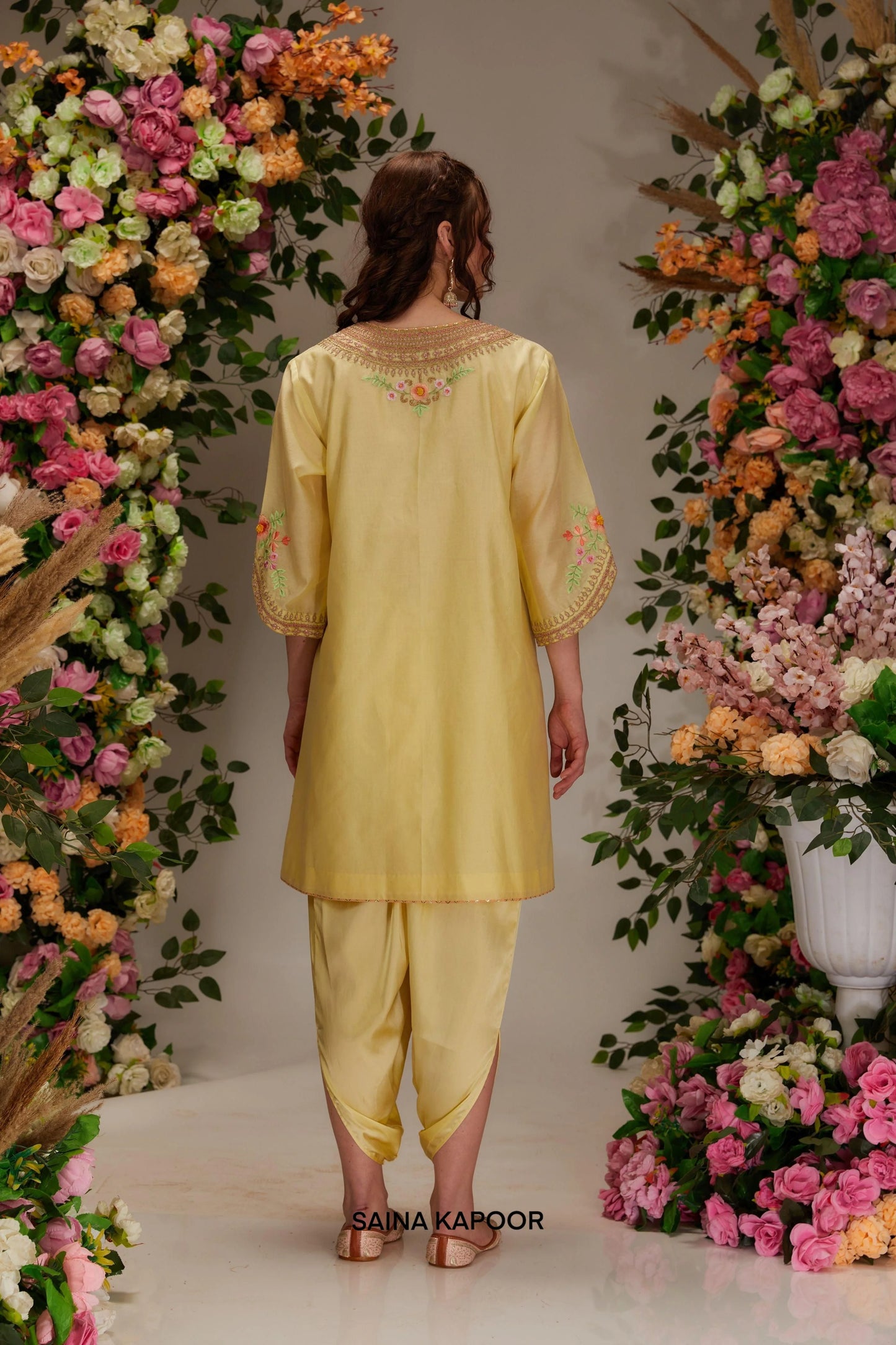 Back view of yellow Chanderi A-line kurta set for women with voluminous sleeves & dhoti pants — Saina Kapoor