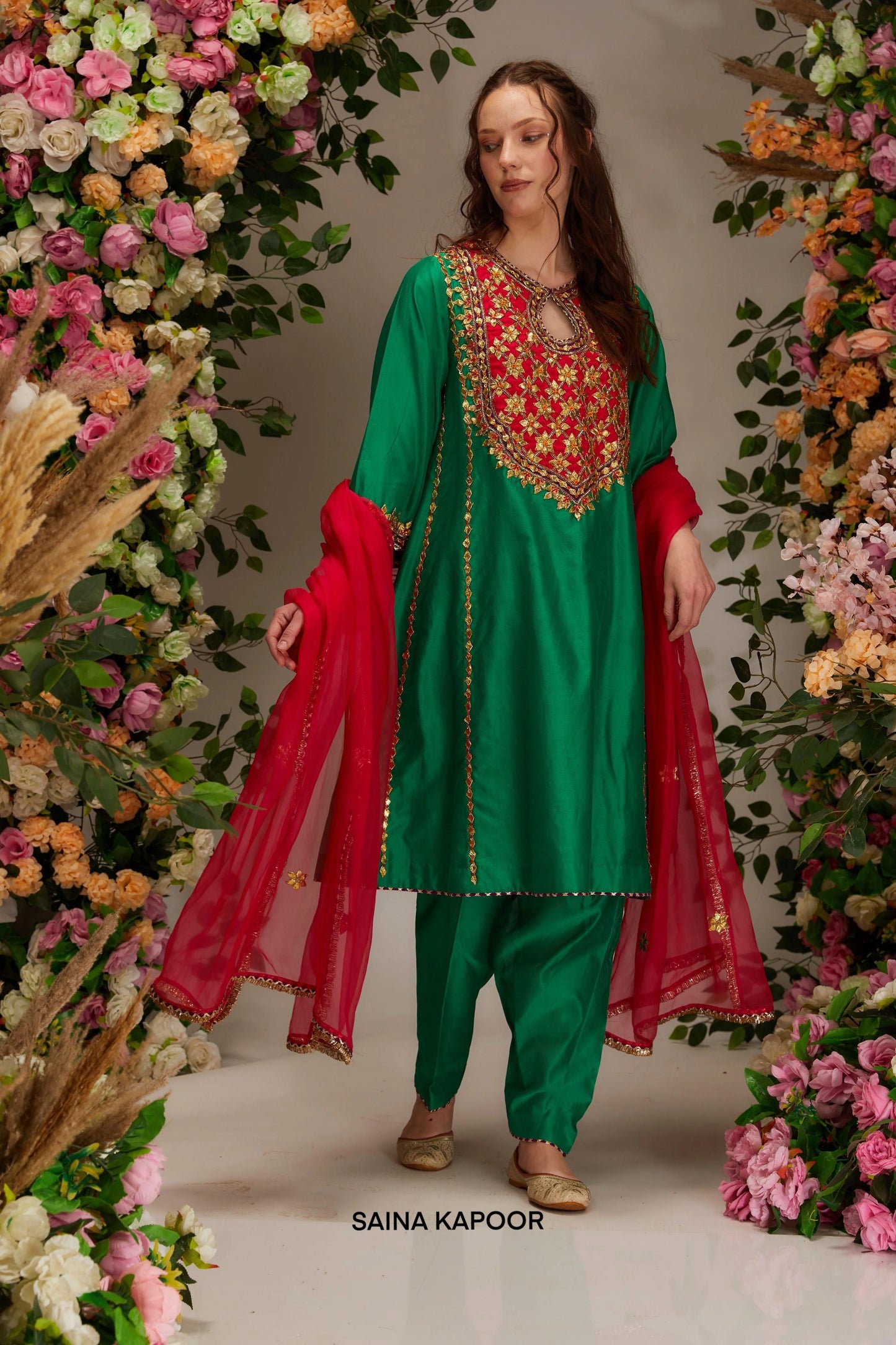 Emerald green Chanderi kalidar salwar suit with geometric gota moti yoke & red organza dupatta — Saina Kapoor